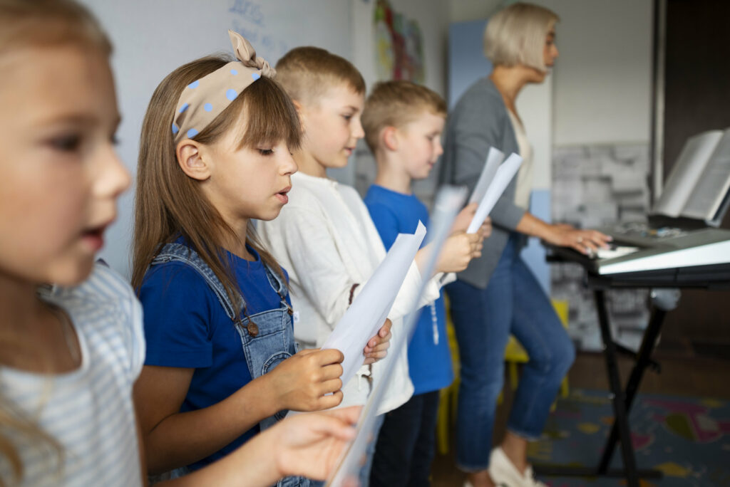 side view kids singing together sunday school